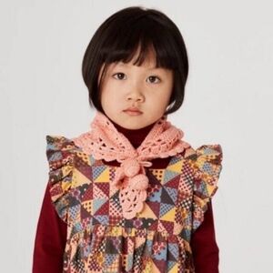 misha and puff crochet scarf with pom poms